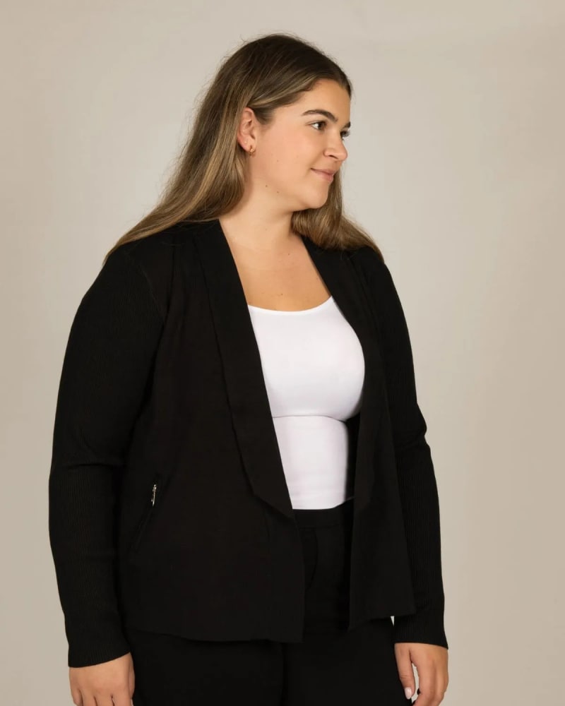 Front of a model wearing a size XL Amanda Cardigan Knit Lapel Collar Black in Black by ANNICK. | dia_product_style_image_id:317335